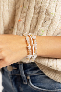 Notoriously Nuanced - White Coil Bracelet